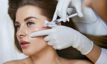 Dermatologist Injecting A Patient With Dermal Fillers